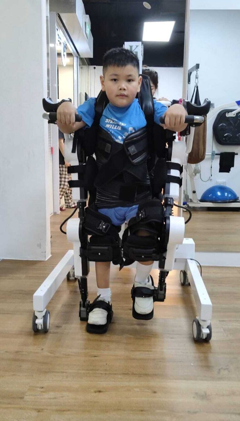 child walking with exoskeleton