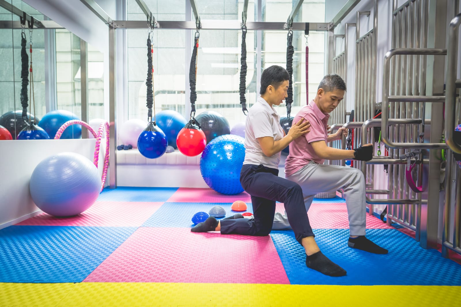 physiotherapists assisting in orthopaedic rehabilitation